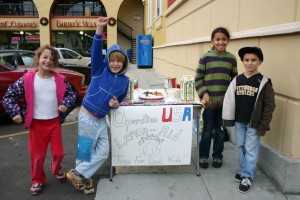 Our youngest supporters, Zoe Lipscomb (8) and her brother Henry (6) launched a lemonade stand this holiday season, in support of OpUSA.  They raised over $200 to buy toys for local kids in foster care. 